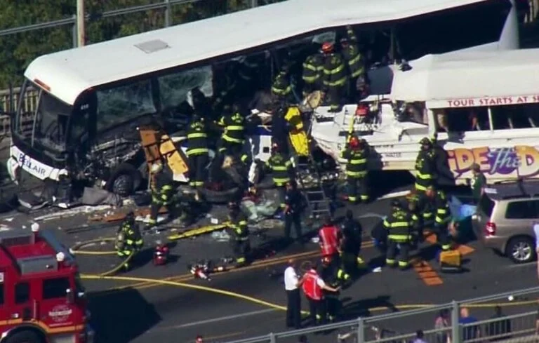 An aerial view of the "Ride the Ducks" crash scene, showing numerous firefighters at work.
