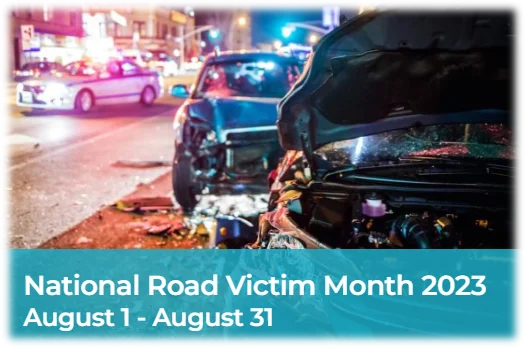 "Car crash scene at night with text promoting National Road Victim Month 2023 in August"