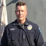 A headshot of police officer J. Nelson of the K-9 Unit in his uniform.