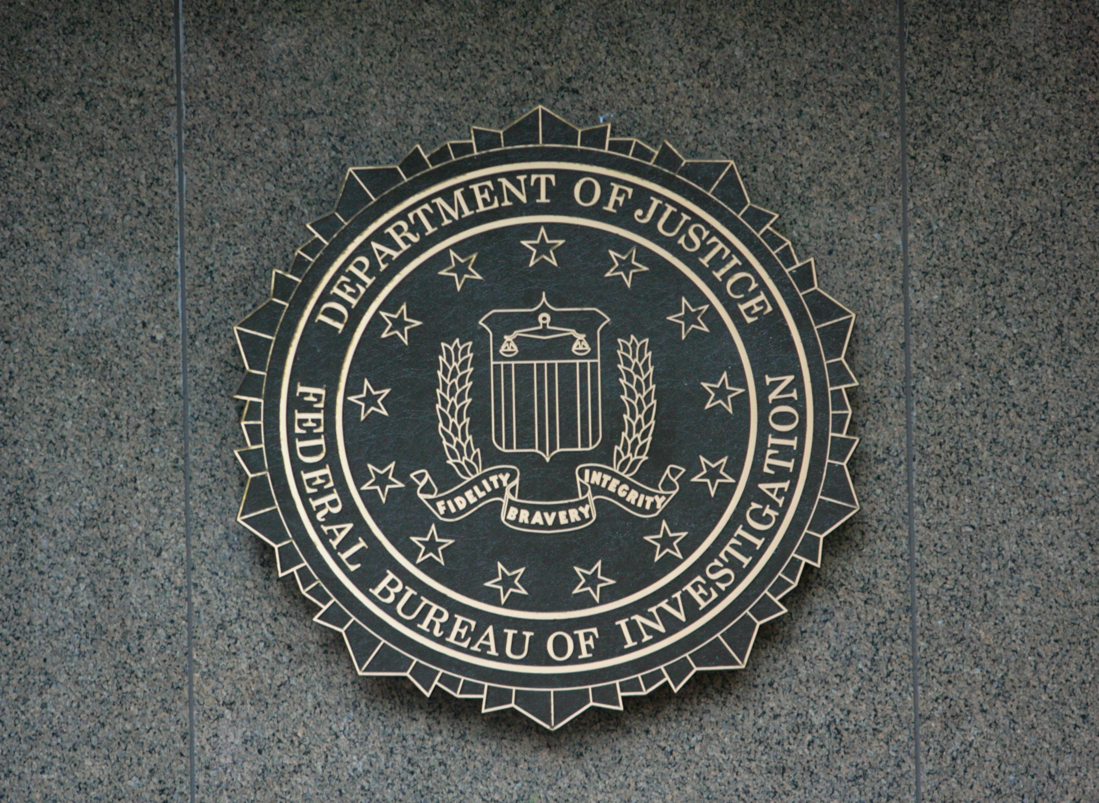 FBI seal on the wall of a federal building